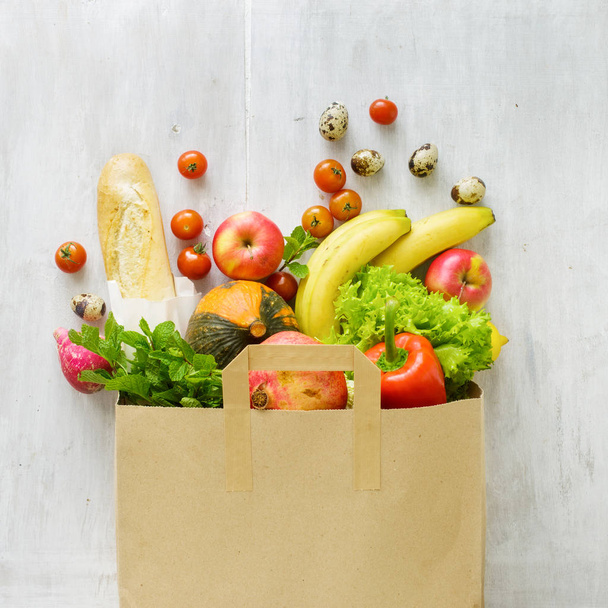 Top view paper bag of different fresh health food - Foto, immagini