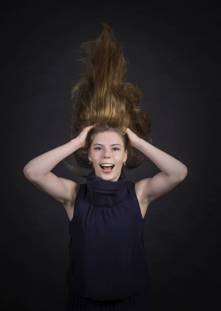Portrait of happy girl with long hair. - Фото, зображення