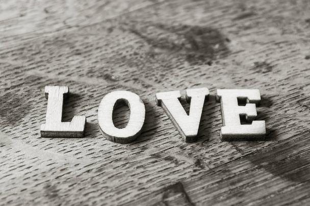 concept wooden word on wooden table - Love - Fotografie, Obrázek