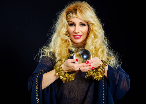 Woman fortune teller with crystal ball portrait - Photo, Image