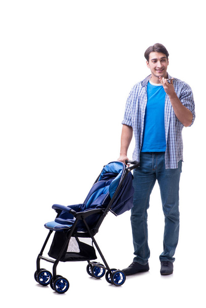 Jovem pai com carrinho de bebê isolado em branco
 - Foto, Imagem