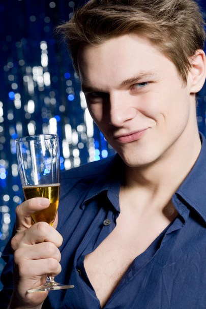 Handsome man drinking champagne - Фото, изображение