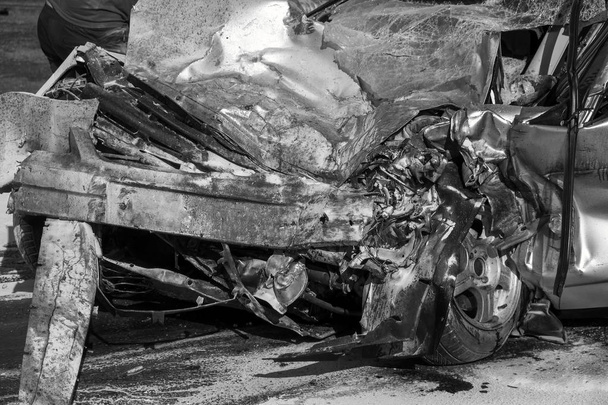 Damaged vehicle closeup after car crash. Black and White Image - Photo, Image