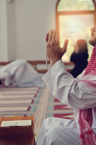 Religious muslim man praying inside the mosque - Photo, Image