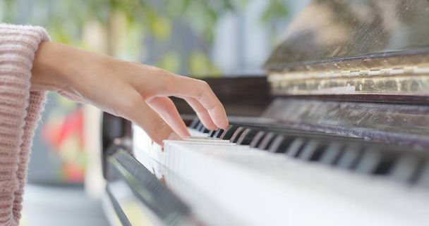 Female hands playing piano  - Photo, Image