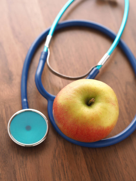 Healthcare concept with fresh organic fruits - Photo, Image