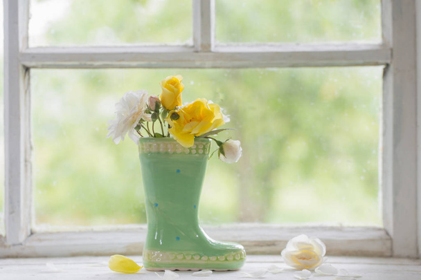 roses in vase on window sill - Fotó, kép