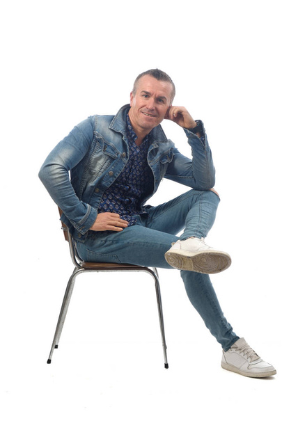 man sitting on a chair with white background - Fotografie, Obrázek
