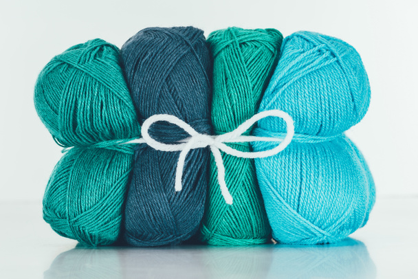 blue and green knitting yarn balls on white - Photo, Image