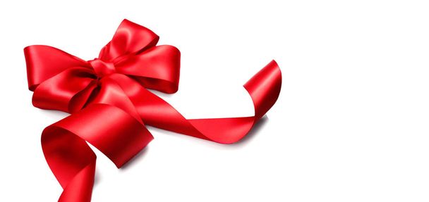 Red satin gift bow. Ribbon. Isolated on white - Фото, изображение