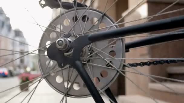 Closeup toned footage of spinning wheel of old bicycle - Footage, Video