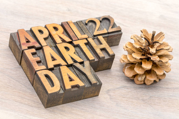 April 22 Earth Day sign in letterpress wood type - 写真・画像