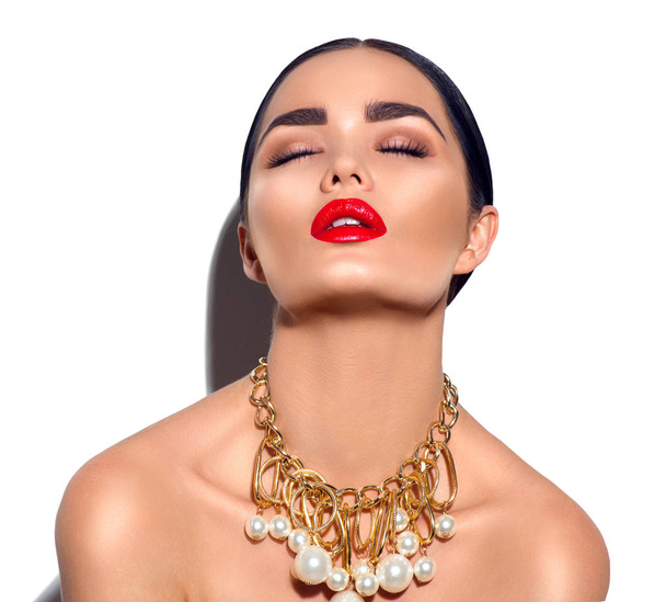 fashion model with red lips and trendy golden accessories - Zdjęcie, obraz
