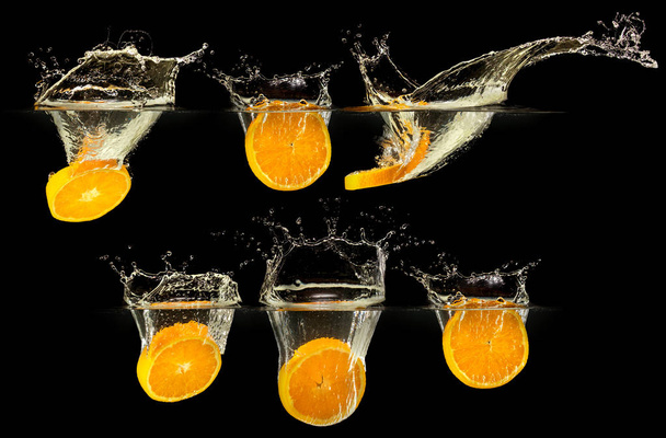 Group of fresh fruits falling in water - Photo, image
