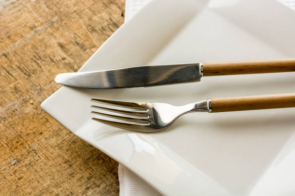 fork and knife with wooden handle  - Foto, Bild