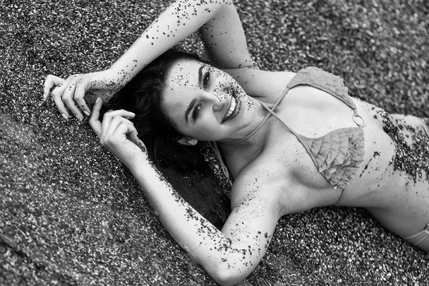 Pretty happy girl smiling on sea beach - Photo, image