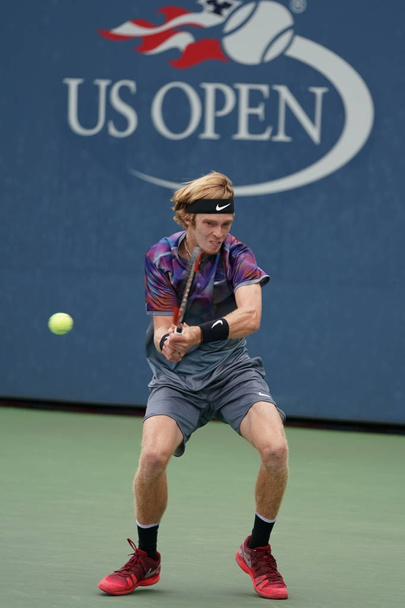 NEW YORK - SEPTEMBER 2, 2017: Professional tennis player Andrey Rublev of Russia in action during his US Open 2017 third round match at Billie Jean King National Tennis Center  - Фото, зображення