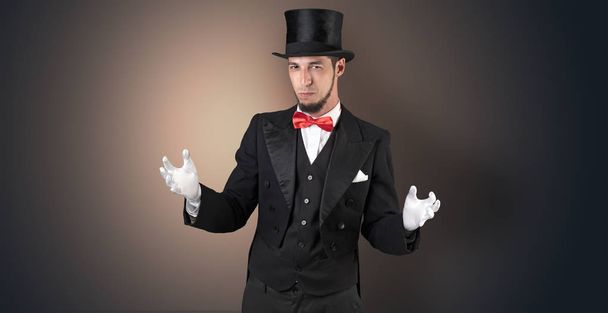Magician holds something invisible  - Foto, immagini