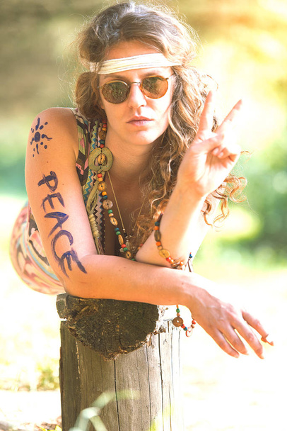 Pretty free hippie girl. Peace. Body painting - Vintage photo ef - Photo, Image