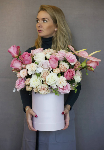 The beautiful bouquet of different roses in white box  - Valokuva, kuva