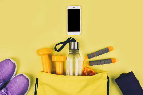 Creative flat lay of sport and fitness equipments - Foto, afbeelding