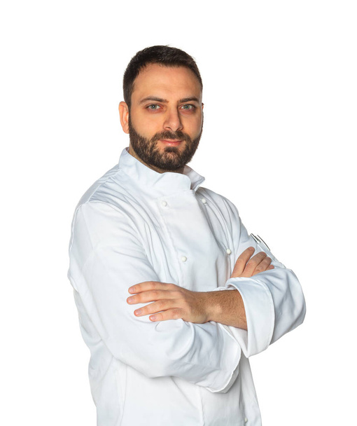Young chef on white background. - Foto, imagen