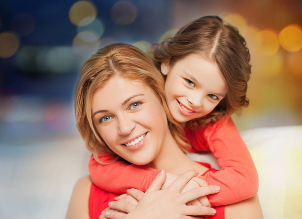 happy mother and daughter hugging - 写真・画像