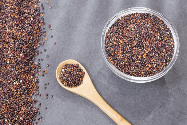 Black quinoa in the bowl - Chenopodium quinoa - Foto, afbeelding