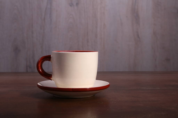 A cup of espresso coffee on a dark wooden background - Foto, Imagem