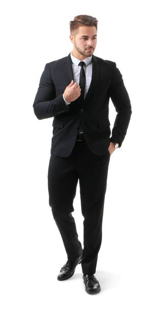Handsome man in formal suit on white background - Φωτογραφία, εικόνα
