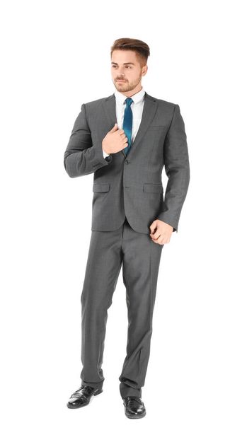 Handsome man in formal suit on white background - Photo, image
