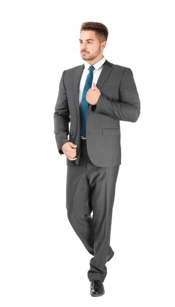 Handsome man in formal suit on white background - Photo, image