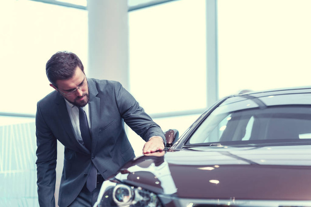 Businessman with a car - Photo, Image