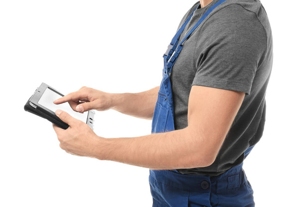 Auto mechanic with tablet computer on white background, closeup - Foto, Imagen