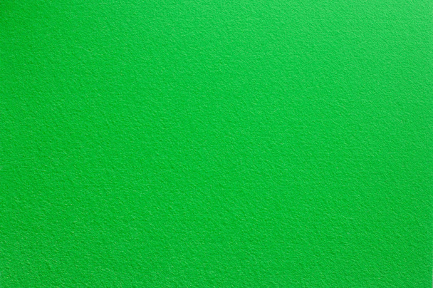 Αισθητή στην επιφάνεια σε χρώμα πράσινο φως. Αφηρημένα φόντο και υφή για το σχεδιασμό. - Φωτογραφία, εικόνα