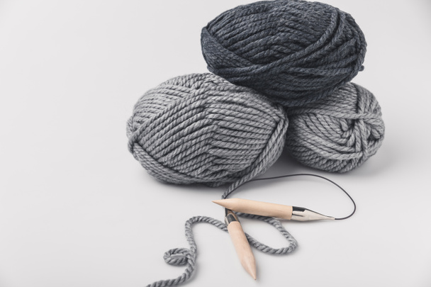 grey yarn balls and knitting needles isolated on white - Photo, Image