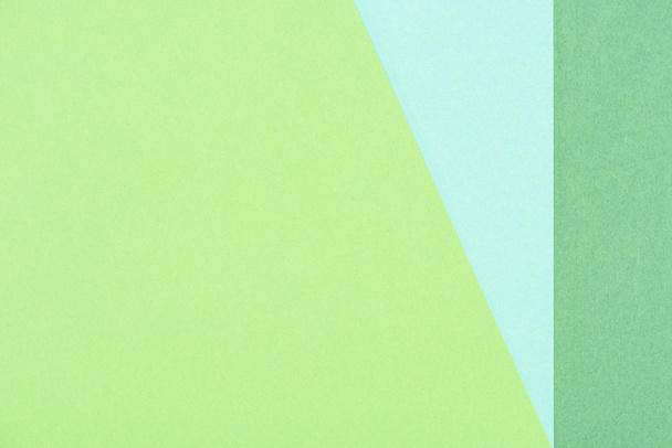 close-up shot of green and blue paper layers for background - Φωτογραφία, εικόνα