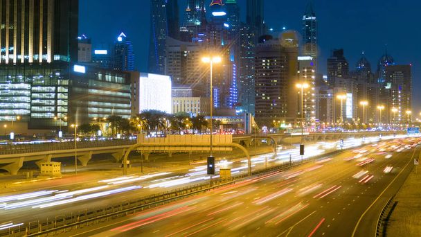 beautiful night timelapse of a road in Dubai, UAE - Photo, Image