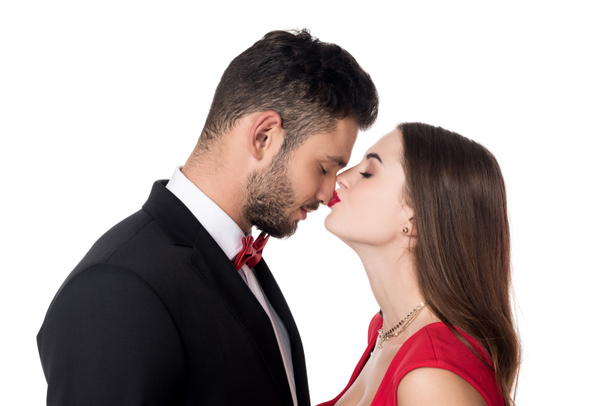 side view of girlfriend kissing boyfriends nose isolated on white - Photo, Image
