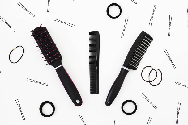 Tools for the hairdresser on white background. Beauty composition. Flat lay, top view - Foto, imagen