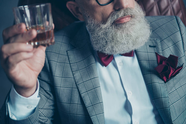 Close up cropped half face portrait of bearded old rich man in f - 写真・画像