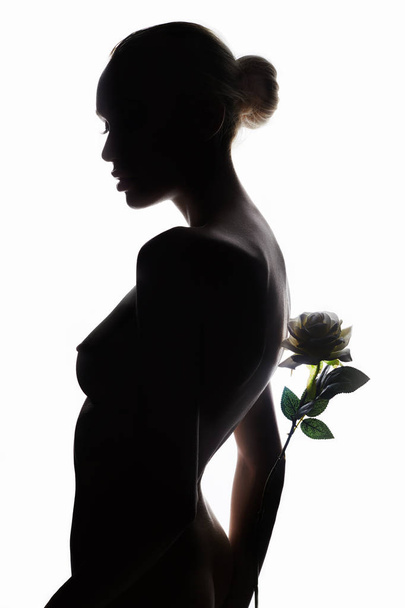 nude woman with rose flower - Zdjęcie, obraz