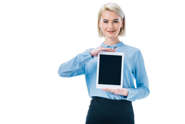 attractive businesswoman showing tablet with blank screen, isolated on white - Photo, Image
