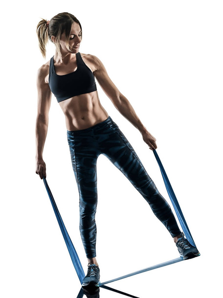 woman pilates fitness elastic resistant band exercises silhouett - Photo, Image