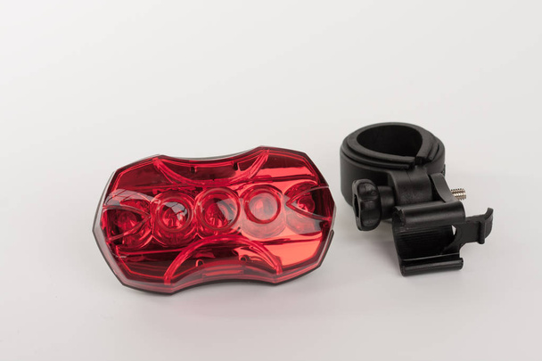 Reflector de bicicleta trasera roja y soporte de reflector, studio phot
 - Foto, Imagen