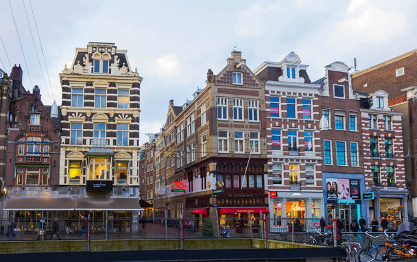 Amsterdam, Netherlands - December 14, 2017: The buildings of Amsterdam city - Fotoğraf, Görsel