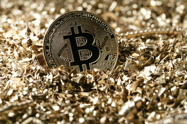 Physical symbolic metal golden version of bitcoin cryptocurrency - Photo, Image
