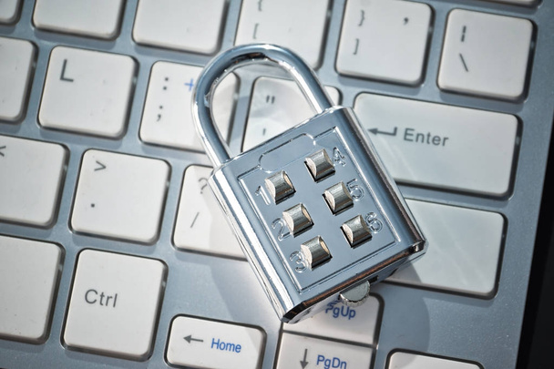 Security lock on computer keyboard - Computer security and countermeasure on data encryption concept - Photo, Image