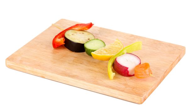 Sliced vegetables on wooden pick isolated on white - Fotoğraf, Görsel