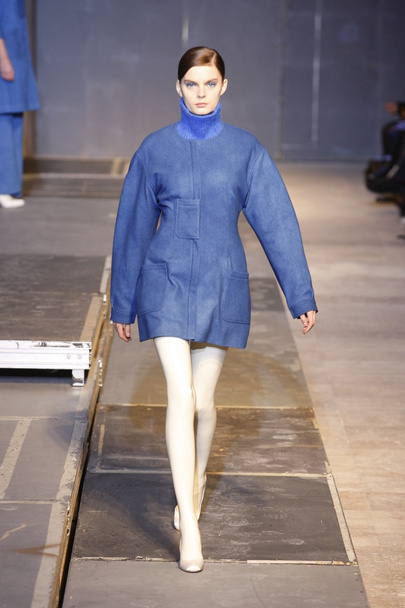 A model walks the runway during the Aganovich Ready to Wear Autumn Winter 2011 2012 show during Paris Fashion Week at Palais De Tokyo on March 1, 2011 in Paris, France - Fotó, kép